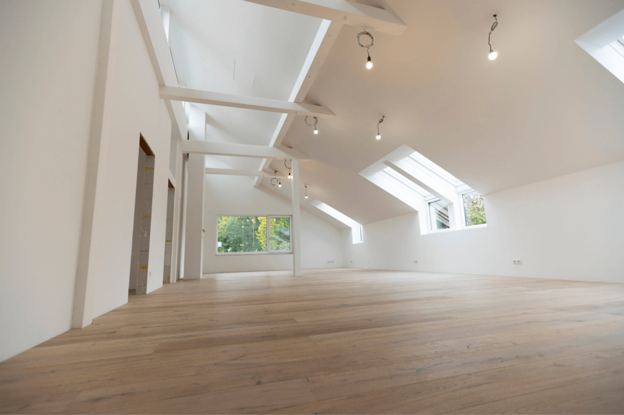 bright, new loft apartment with new parquet floor, without baseboards, skirting boards, modern living